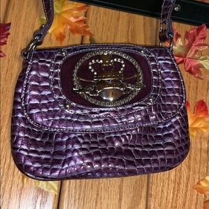 Gently used purple purse